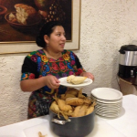 woman making tamales